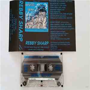 Rebby Sharp - In One Mouth And Out The Other