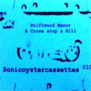 The Driftwood Manor - A Cross Atop A Hill